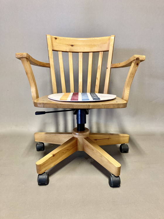 Image 1 of Solid pine swivel and reclining armchair