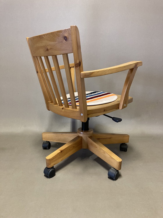 Image 1 of Solid pine swivel and reclining armchair