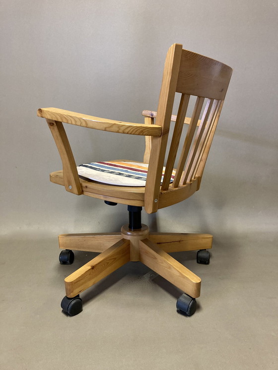 Image 1 of Solid pine swivel and reclining armchair