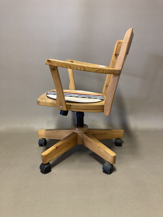 Image 1 of Solid pine swivel and reclining armchair