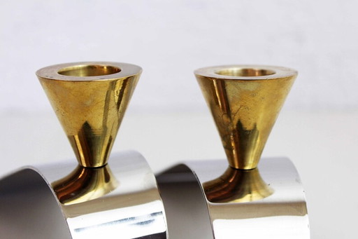 Chromed metal and brass candlesticks