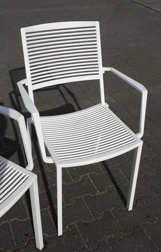 Image 1 of 4 Fast Easy Chairs white stackable