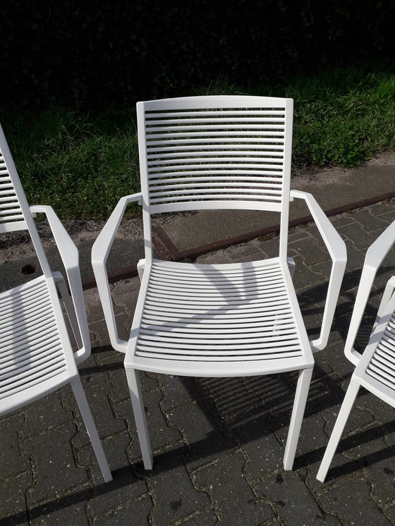 Image 1 of 4 Fast Easy Chairs white stackable