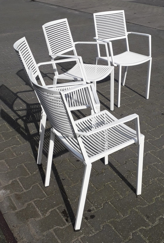 Image 1 of 4 Fast Easy Chairs white stackable