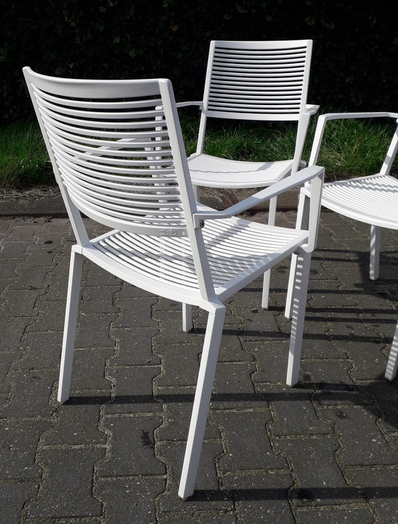 Image 1 of 4 Fast Easy Chairs white stackable