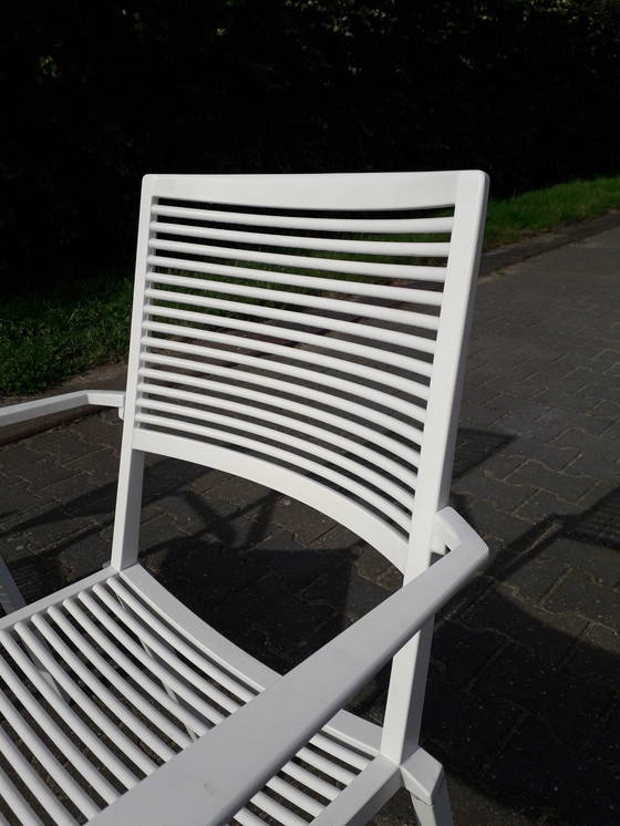 Image 1 of 4 Fast Easy Chairs white stackable