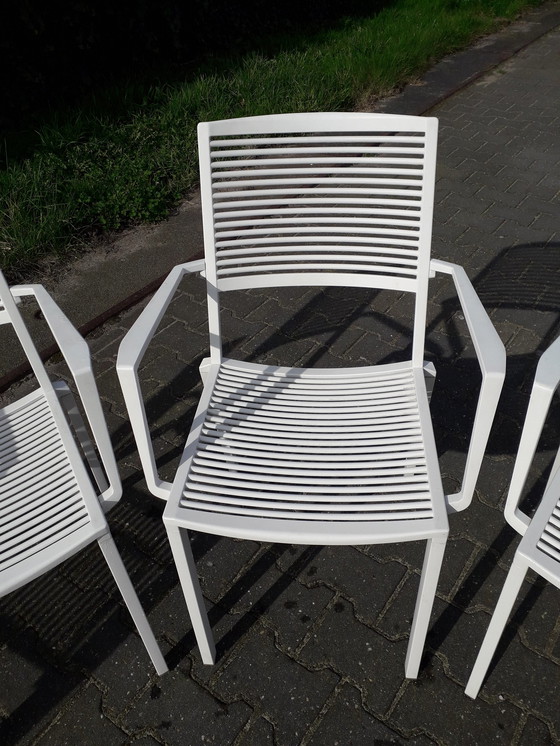 Image 1 of 4 Fast Easy Chairs white stackable