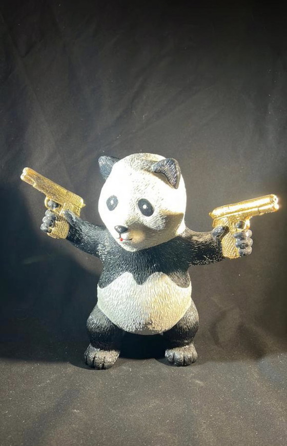 Image 1 of From Apple design golden gun panda