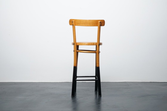 Image 1 of Industrial stool made of wood & metal with backrest