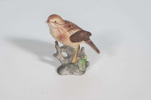 Statuina di tordo in porcellana d'epoca, uccello decorativo in porcellana