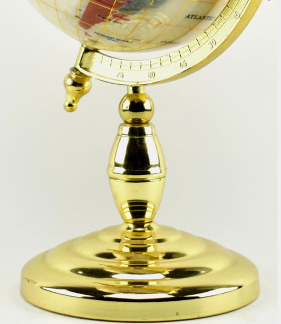 Image 1 of Globe terrestre vintage sur base en laiton