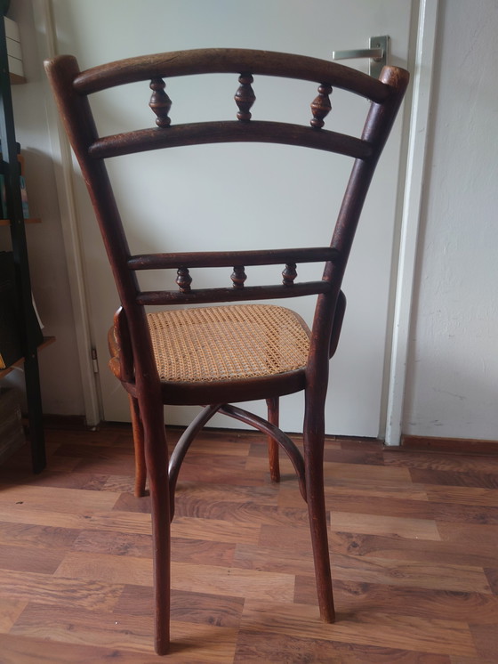 Image 1 of Antique Wooden chair, handwoven webbing