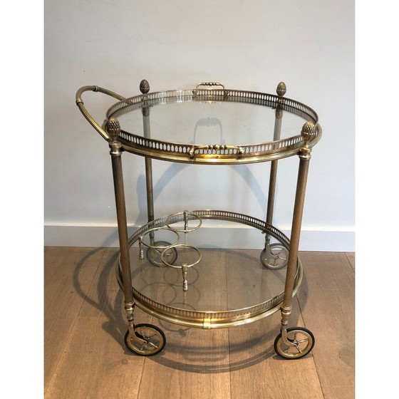 Image 1 of Vintage round brass table on wheels by Maison Baguès, 1940