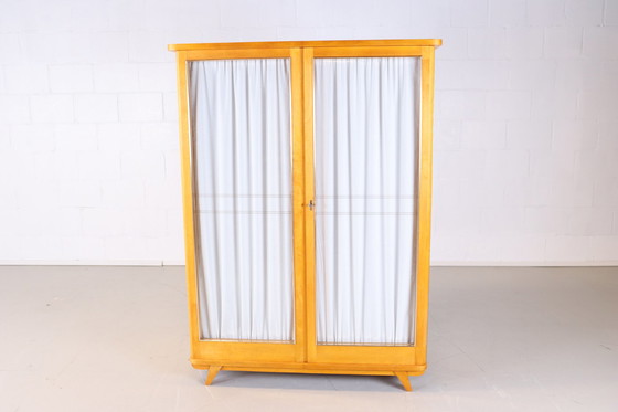 Image 1 of wardrobe with curtains