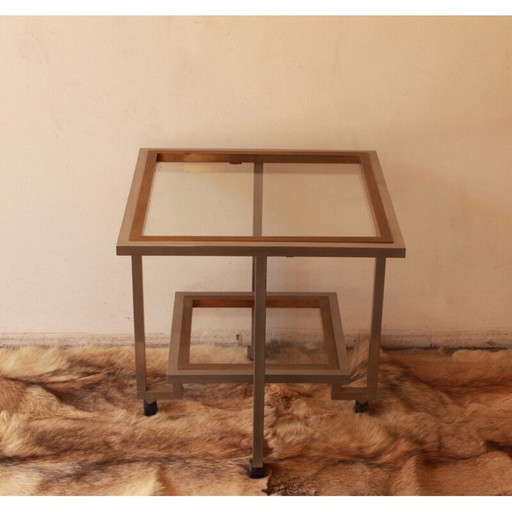 Vintage glass and chromed metal table with double top mounted on casters, 1970