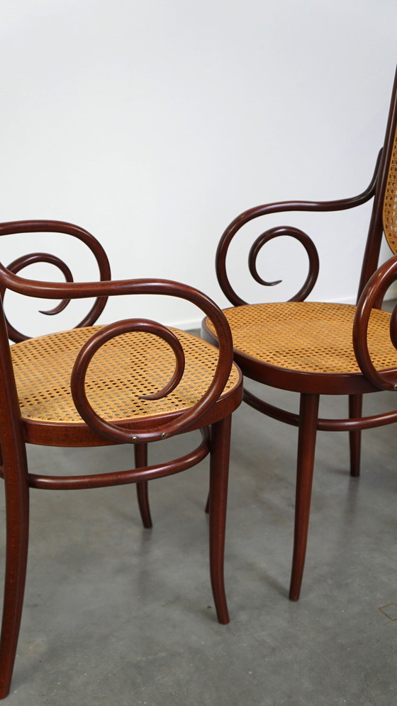 Image 1 of 2 x Tall dark brown original vintage Thonet chair with armrests