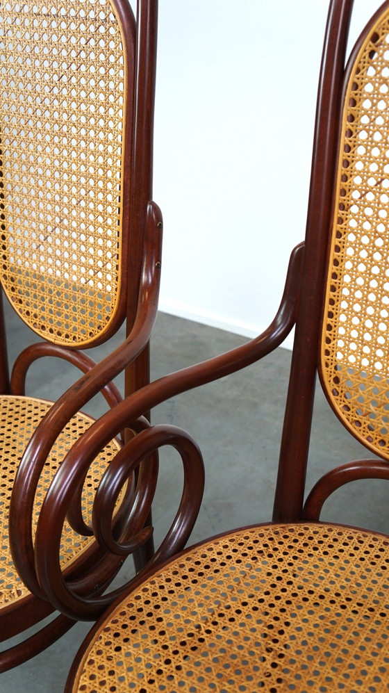 Image 1 of 2 x Tall dark brown original vintage Thonet chair with armrests