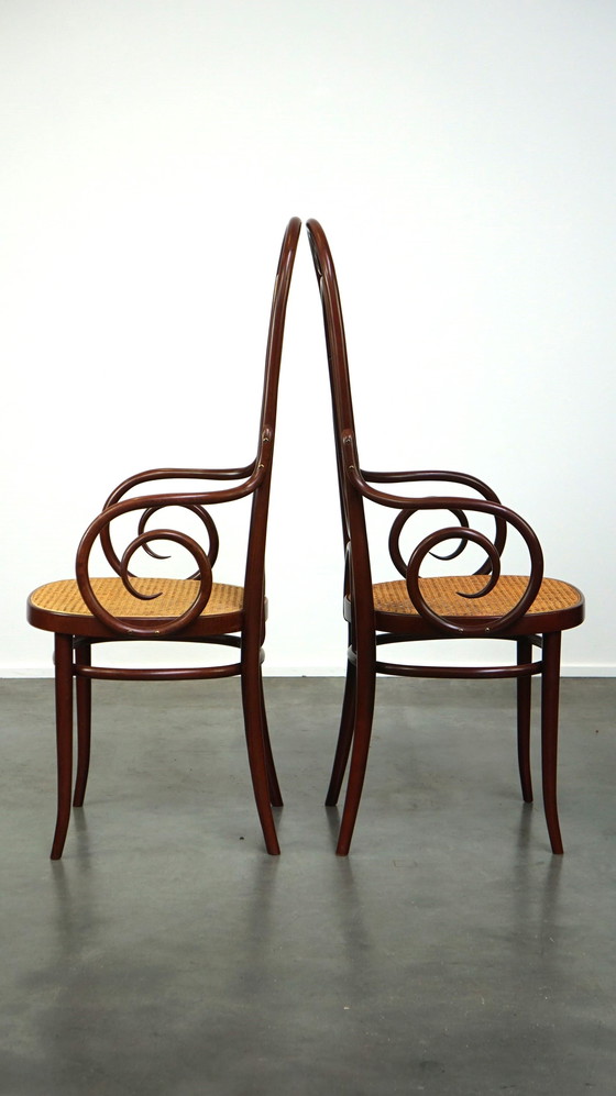 Image 1 of 2 x Tall dark brown original vintage Thonet chair with armrests