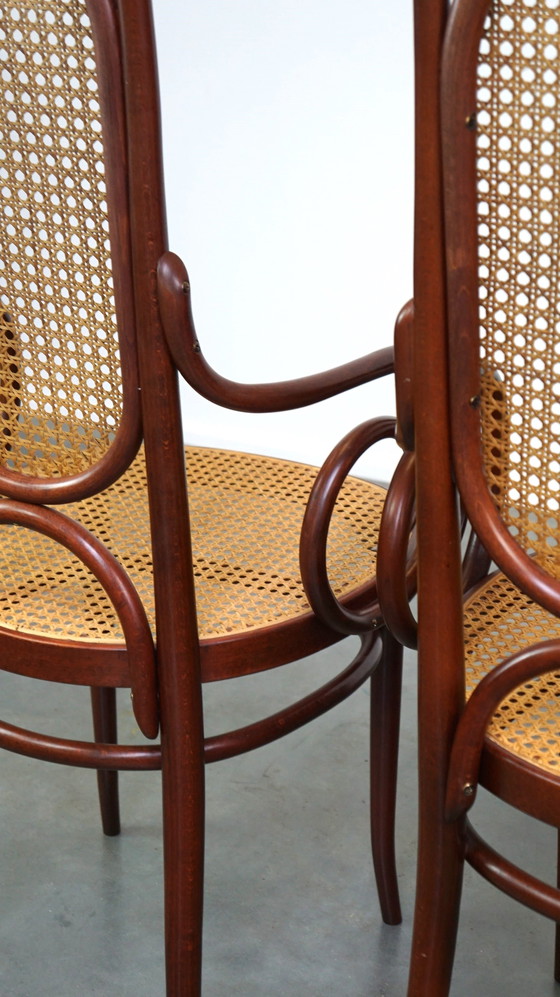 Image 1 of 2 x Tall dark brown original vintage Thonet chair with armrests