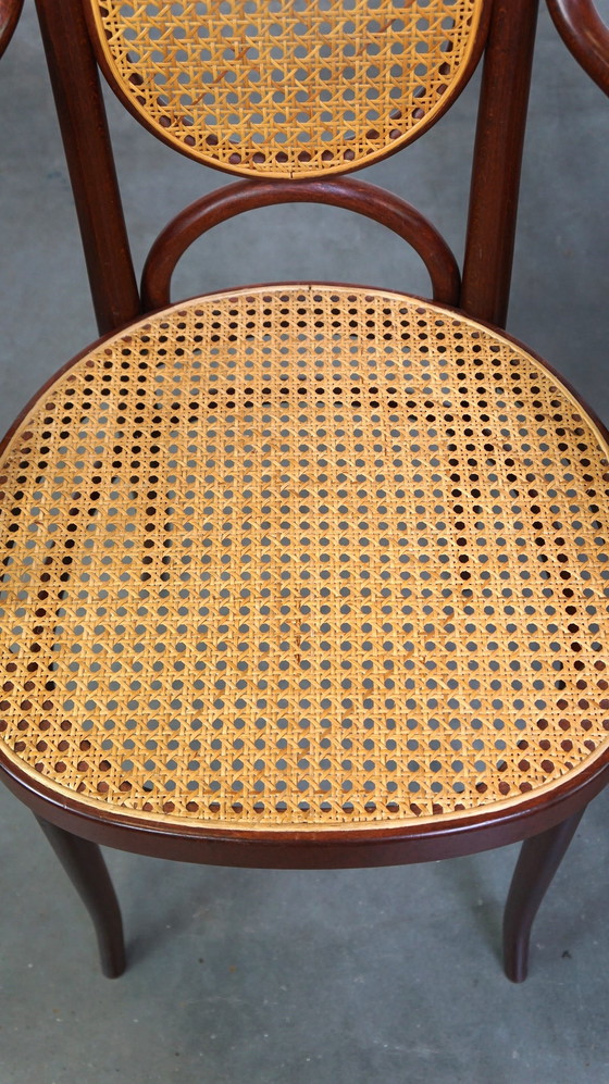 Image 1 of 2 x Tall dark brown original vintage Thonet chair with armrests