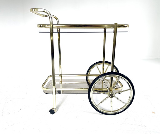 Smoked glass & brass coated bar cart