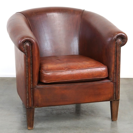 Fauteuil club spacieux en cuir de mouton avec coussin d'assise amovible