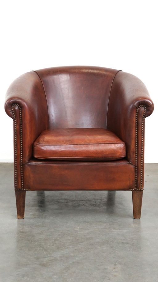 Fauteuil club spacieux en cuir de mouton avec coussin d'assise amovible