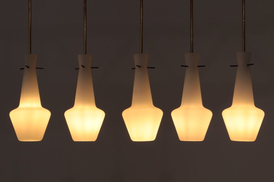 Image 1 of Opaline glass set of 5 pendant lights with brass, Sweden 1960s