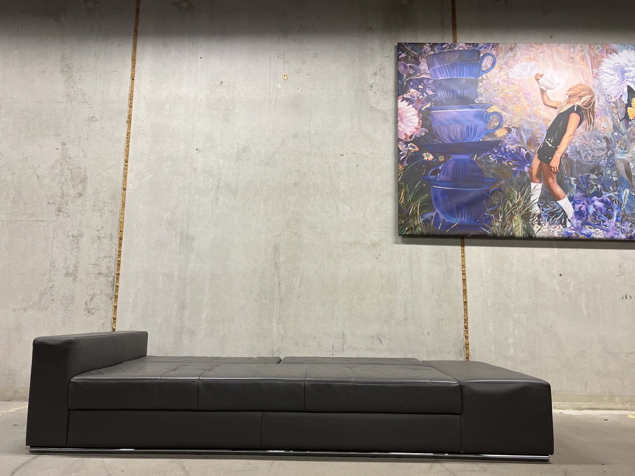 Divano letto Leolux Nocturne in pelle grigia