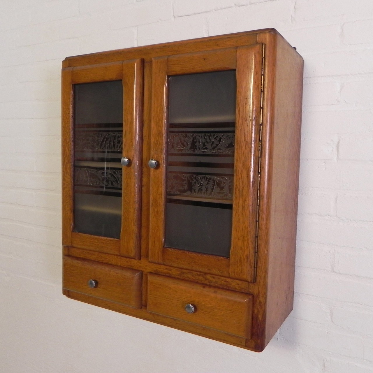 Armario de pared con 2 puertas con cristal figurado y 2 cajones, años 50