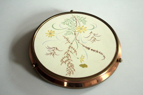 Image 1 of 1950S Rotating cake plate with copper mounting Round on foot