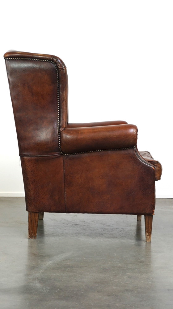 Image 1 of Grand fauteuil à oreilles en cuir de mouton