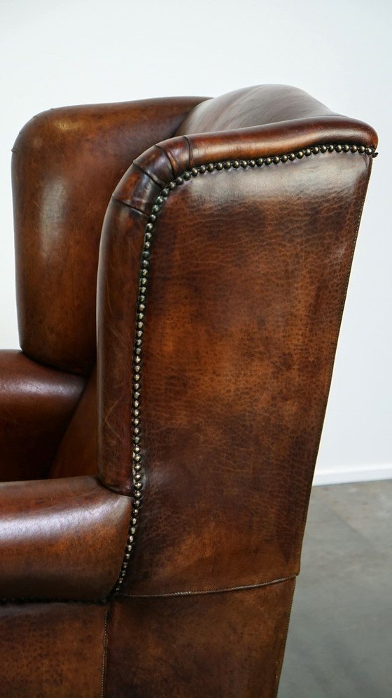 Image 1 of Grand fauteuil à oreilles en cuir de mouton