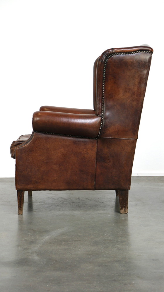 Image 1 of Grand fauteuil à oreilles en cuir de mouton