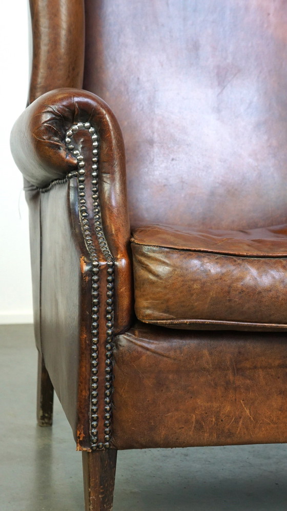 Image 1 of Grand fauteuil à oreilles en cuir de mouton