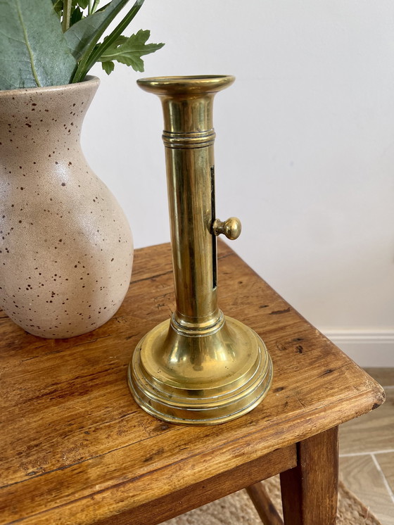 Image 1 of Brass Push Candle Holder