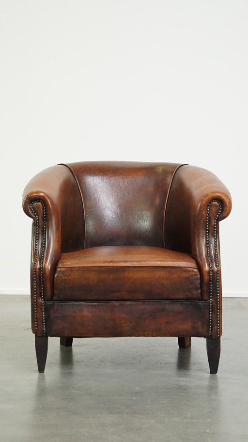 Sheep Leather Club Chair Finished With Ornamental Nails