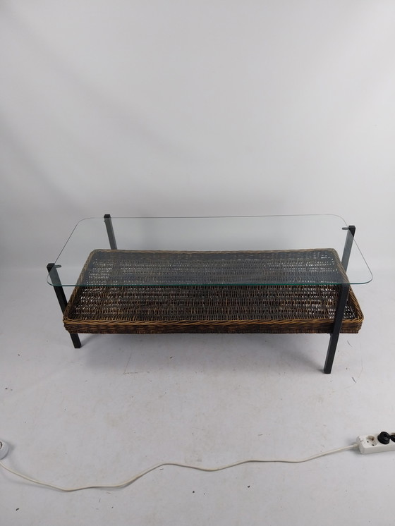 Image 1 of 1970s metal and glass coffee table with wicker basket. 