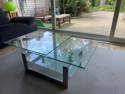 Table basse moderne pivotante en verre