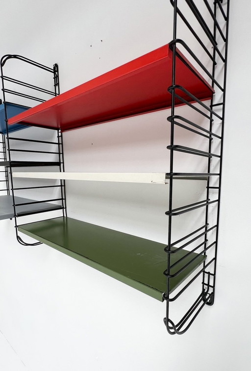 Nine-Piece Blue/Red Tomado Wall Rack From A. Dekker, 1950'S