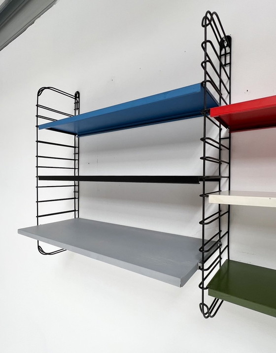 Image 1 of Nine-Piece Blue/Red Tomado Wall Rack From A. Dekker, 1950'S