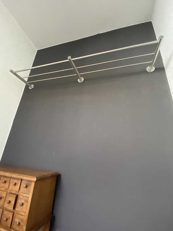 Image 1 of Stainless steel coat rack with coat hangers