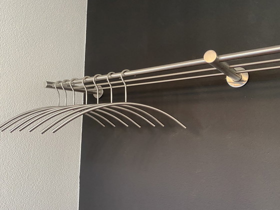 Image 1 of Stainless steel coat rack with coat hangers