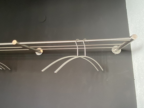 Image 1 of Stainless steel coat rack with coat hangers