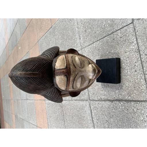 Vintage Panu Gabon mask in wood and base