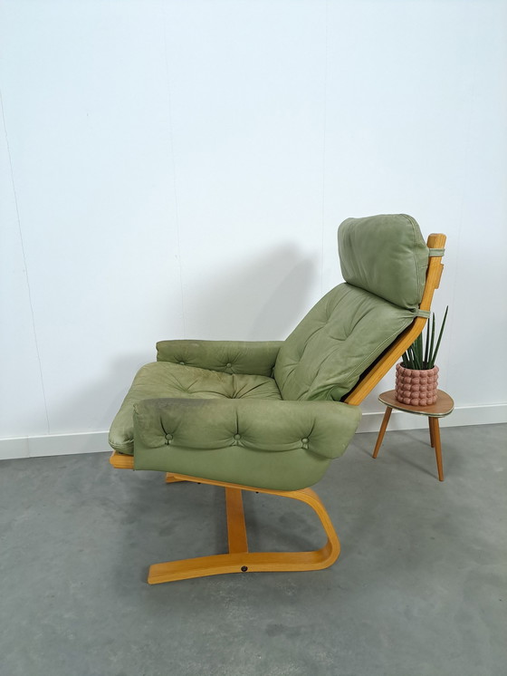 Image 1 of Green Leather Armchair With Wooden Frame