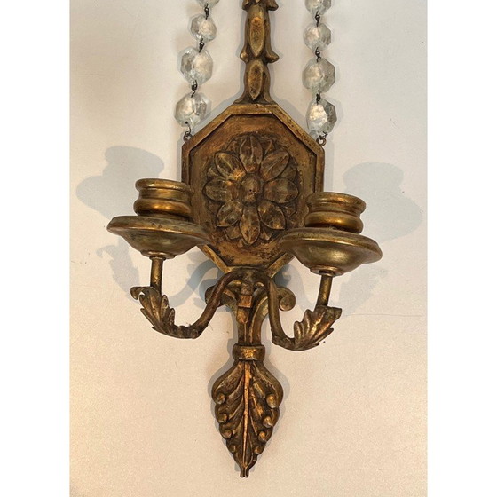 Image 1 of Pair of vintage gilded carved wood sconces with crystal garlands, France 1940