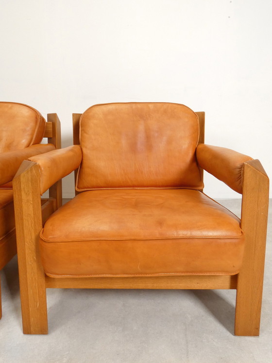 Image 1 of 2 oak armchairs in cognac leather by Skilla