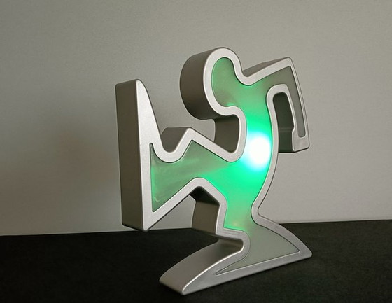 Image 1 of Keith Haring La Linea Lamp Osvaldo Cavandoli argenté dans son emballage d'origine