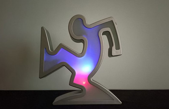 Image 1 of Keith Haring La Linea Lamp Osvaldo Cavandoli argenté dans son emballage d'origine